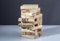 The text on the wooden blocks SET BOUNDARIES Royalty Free Stock Photo