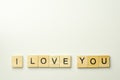 Text wooden blocks spelling the word I LOVE YOU on white background Royalty Free Stock Photo