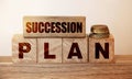 The text on wooden blocks :Succession Plan. Business or education concept