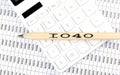 Text 1040 on the wooden pencil on the calculator with chart Royalty Free Stock Photo