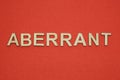 Text the word aberrant from gray wooden small letters