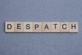 text the word despatch from brown wooden small letters Royalty Free Stock Photo