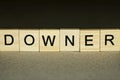 Text on word downer from wooden letters Royalty Free Stock Photo