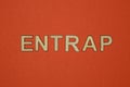 Text the word entrap from gray wooden small letters