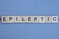 text the word epileptic from brown wooden small letters