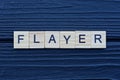 text the word flayer from brown wooden small letters