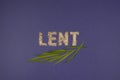 Text, word Lent made of ashes on purple background. Lent Season, Holy Week, Palm Sunday and Good Friday concept