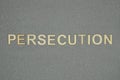 Text on word persecution from wooden letters