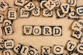 Text Word spelled out from cardboard letters Royalty Free Stock Photo