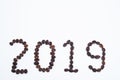 Text 2019 written by coffee beans. Royalty high-quality free stock macro photo image of shape 2019 design text by