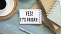 Text Yes it`s Friday on the short note wooden