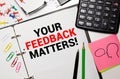 Text your feedback matters on white paper background business concept Royalty Free Stock Photo