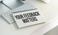 Text your feedback matters on white paper background business concept. Royalty Free Stock Photo