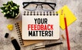 Text your feedback matters on white paper background business concept Royalty Free Stock Photo