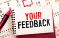 Text your feedback on white paper background, business concept Royalty Free Stock Photo