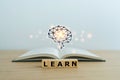 Textbook and learn with bright brain. Business and education concept Royalty Free Stock Photo