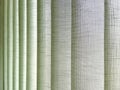 textil venetian blinds, green slat curtains texture, green store curtains and blinds background Royalty Free Stock Photo