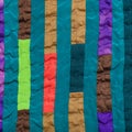 Stitched patchwork headscarf from narrow strips