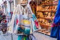 Textile Bag gifts in front of colorful souvenir and gift shops on a busy summer day of Istanbul, Turkey