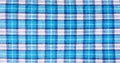 Textile blue box, fabric blue plaid cover. Blue classic checkered pattern. blue checkered fabric closeup , tablecloth texture. Royalty Free Stock Photo