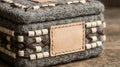 Textile box mockup with blank leather label and bead details Royalty Free Stock Photo