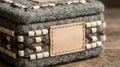 Textile box mockup with blank leather label and beads Royalty Free Stock Photo