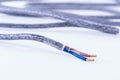 Textile braided electrical cable cord with terminals