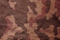 Textile brown camouflage cloth pattern. Royalty Free Stock Photo