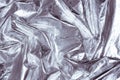 Textile concept. Gray silver metallic fabric texture. 80s, 90s background Royalty Free Stock Photo
