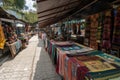 textile craft market, with stalls offering handmade items for sale