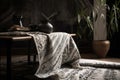 textile with dark, intricate pattern, creating contrast against light and airy room