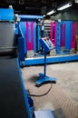 Textile fabric manufacturing machines in work. Royalty Free Stock Photo