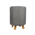 Textile fabric padded stool with wooden legs Royalty Free Stock Photo