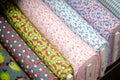 Textile fabric rolls with pattern on market Royalty Free Stock Photo