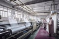 textile factory with workers operating machinery, producing high-quality textiles