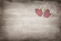 Textile hearts on concrete surface with copy space. Grunge Valentine background