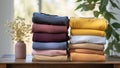 Folded cotton background clothes laundry fabric piled clean colorful stack textile