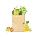 Textile linen shopping bag with farmers market vegetables: celery, lettuce, corn, zucchini, onion. Reusable recyclable plastic