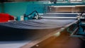 Textile Manufacturing. Circular knitted fabric. Textile factory in spinning production line and a rotating machinery and equipment Royalty Free Stock Photo