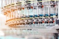 Textile Manufacturing. Circular knitted fabric. Textile factory in spinning production line and a rotating machinery and equipment Royalty Free Stock Photo