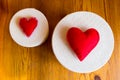 Textile red hearts on gift boxes