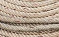 Textile rope thick background. Rough braided twisted cable texture natural pattern