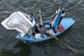 Textile salesmen in their rowing boat near the Esna Lock on the River Nile in Egypt. Royalty Free Stock Photo