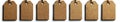 Textile tags in various shapes, made from brown canvas material with stitching, depicted in contemporary illustrations Royalty Free Stock Photo