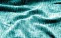 Textile texture with blur effect in cyan color