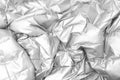 Textile and texture concept - close up of crumpled gray silver metallic fabric background Royalty Free Stock Photo