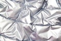 Textile and texture concept - close up of crumpled gray silver metallic fabric background Royalty Free Stock Photo