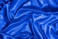 Textiles folds in neon blue-pink light. Trendy colors and shiny abstract background Royalty Free Stock Photo
