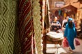 Colourful textiles for sale at the street bazaar in Medina