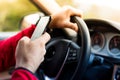 Texting and driving Royalty Free Stock Photo